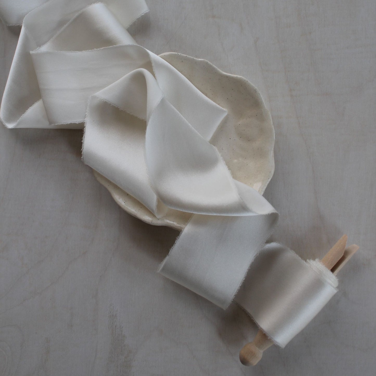 Elegant off-white charmeuse ribbon for wedding flat lays