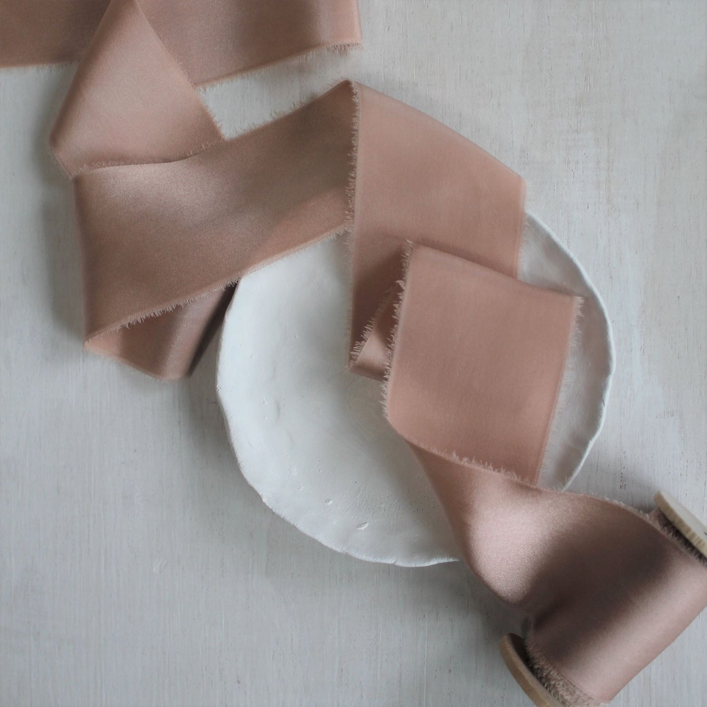 Dusty rose silk charmeuse ribbon draped