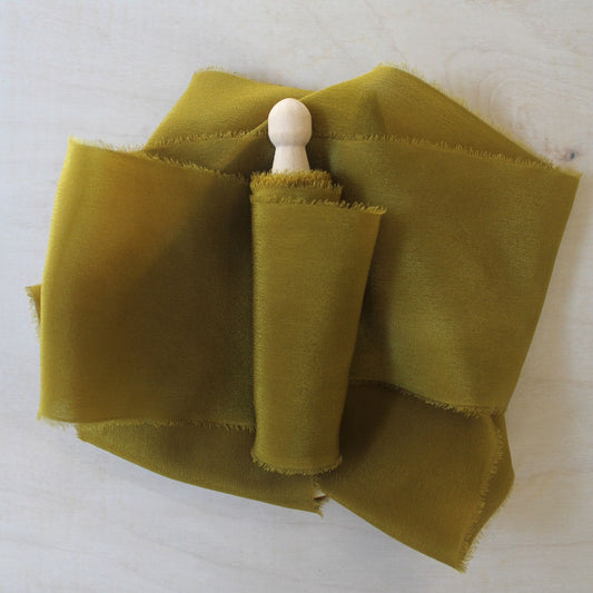 Hand-torn dark chartreuse silk crepe de chine ribbon