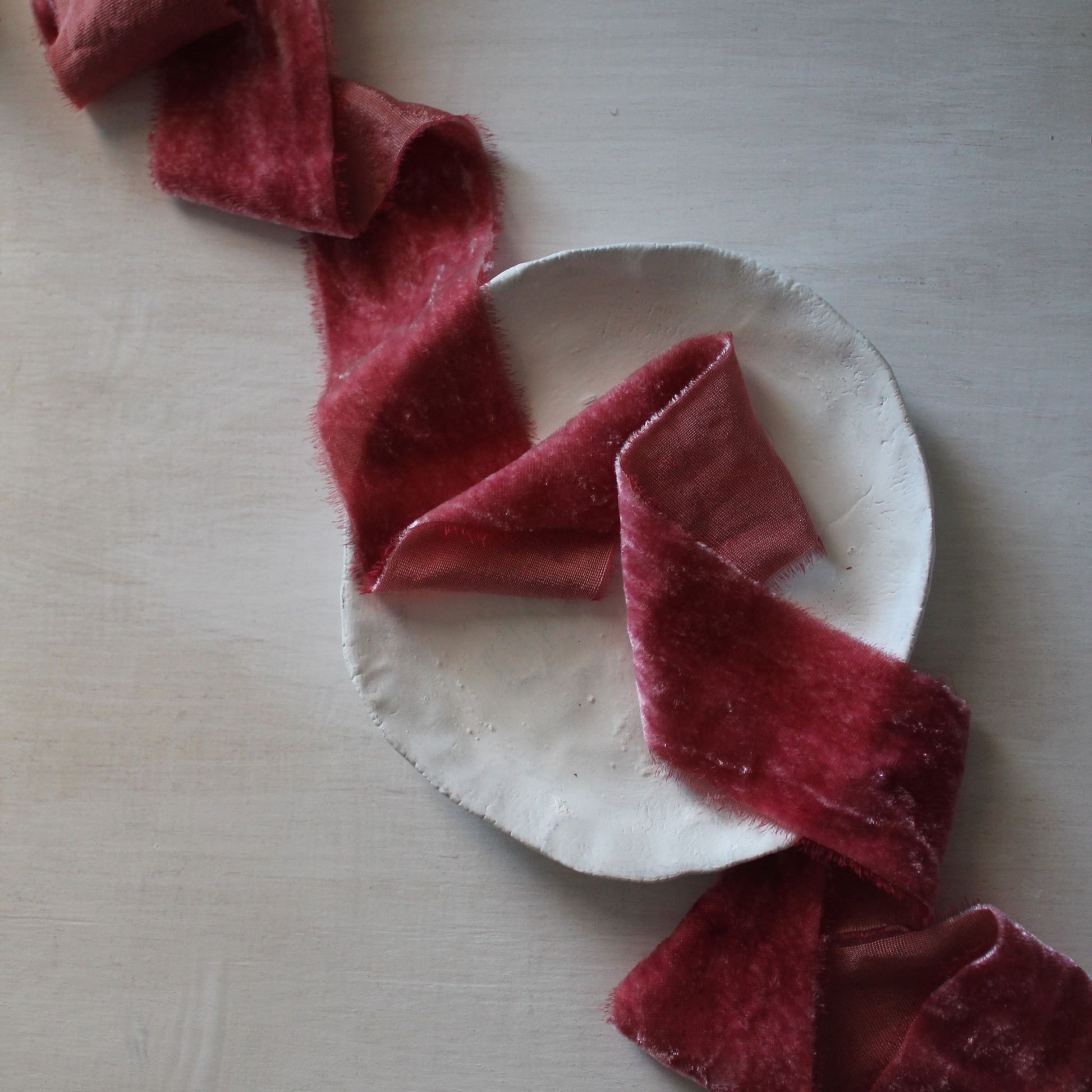 two inch Naturally dyed berry silk velvet ribbon in Canadian-made flat lay