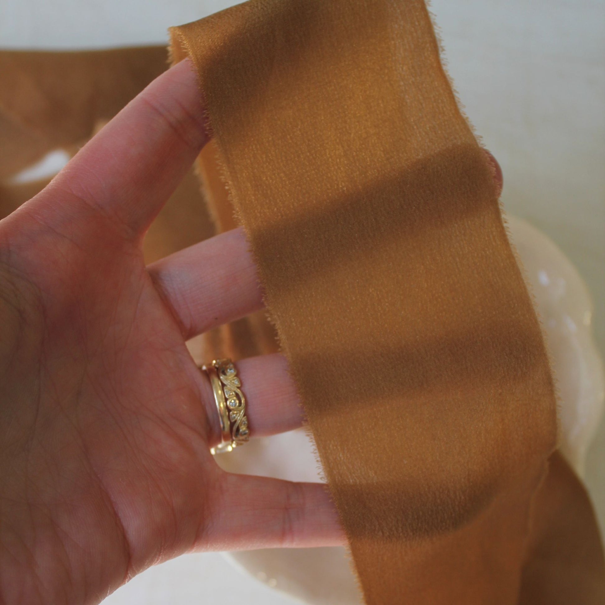 Ribbon detail showing texture and soft frayed edges