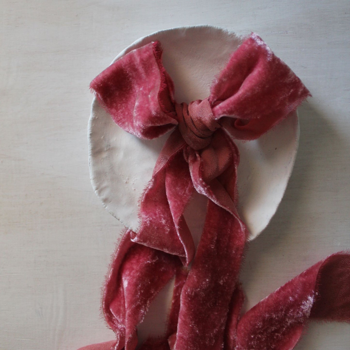 Naturally dyed berry silk velvet ribbon  tied in a bow