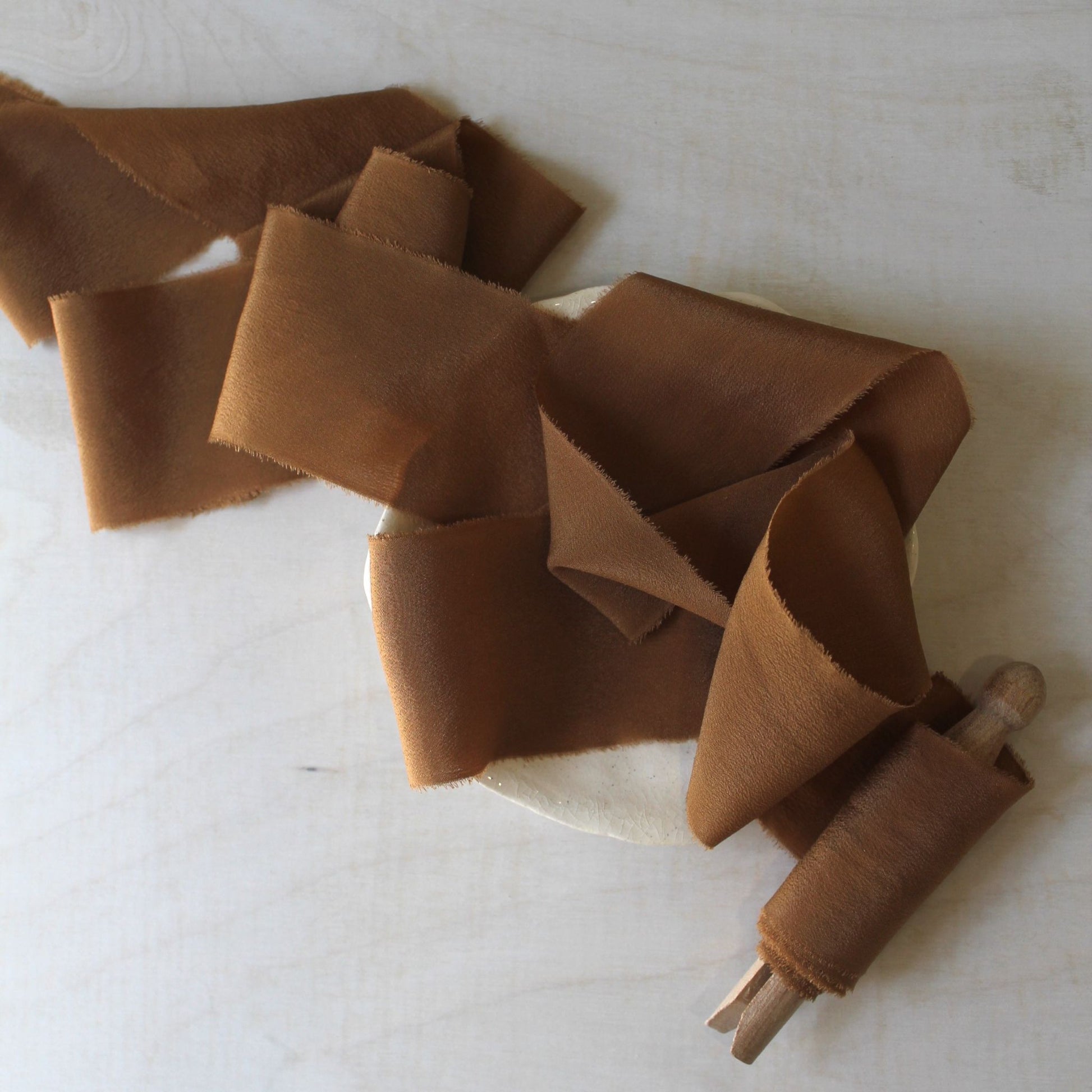 Canadian-dyed silk ribbon for luxury paper goods
