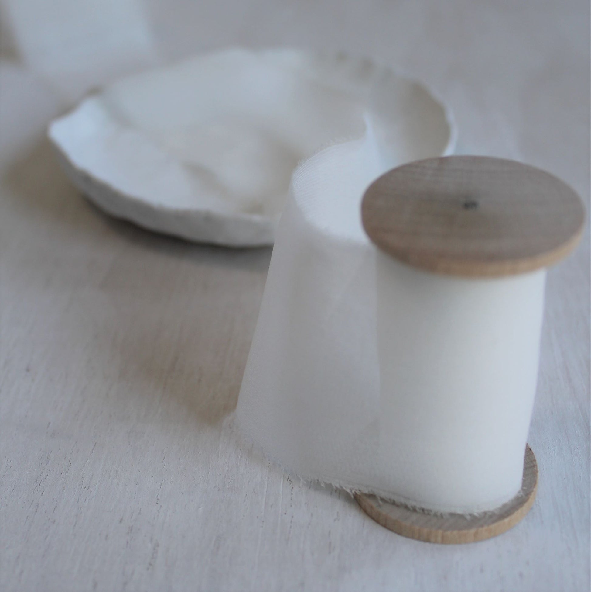 White silk chiffon ribbon in 2" width, 3 yard spool