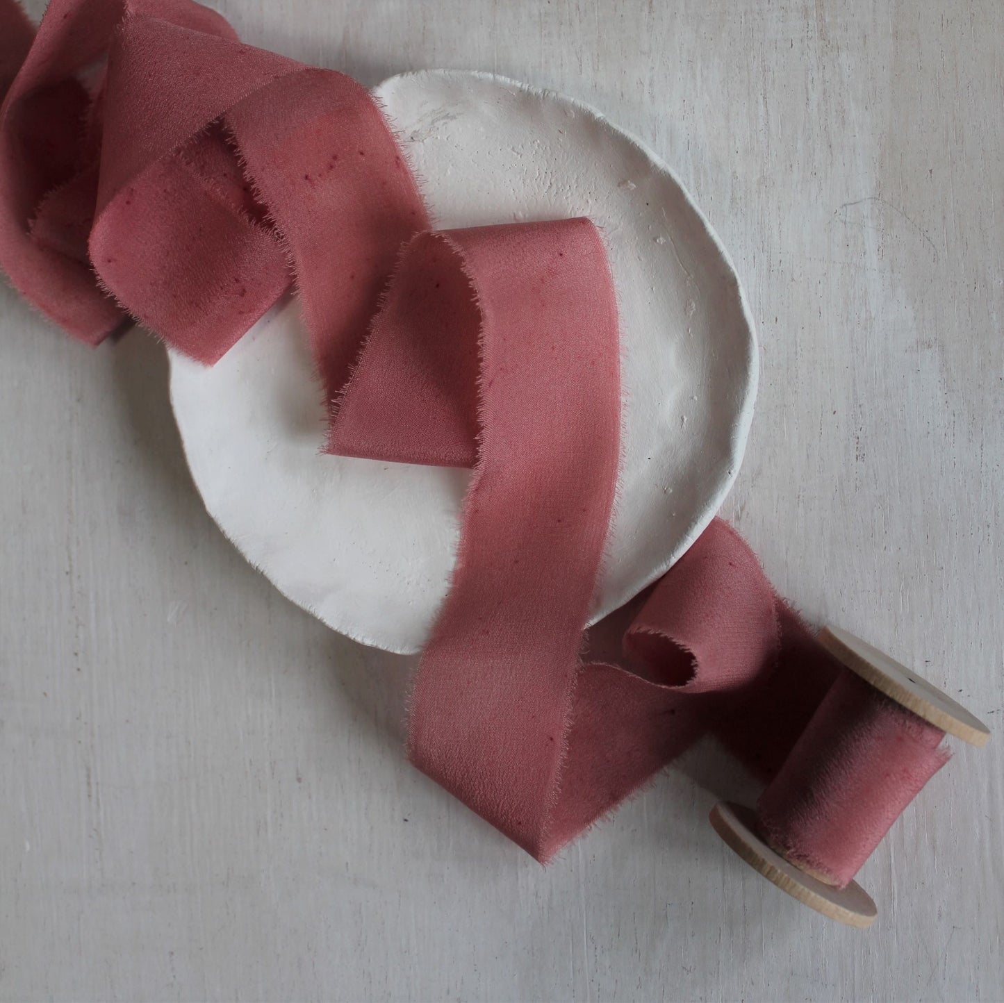 Berry silk crepe de chine ribbon draped