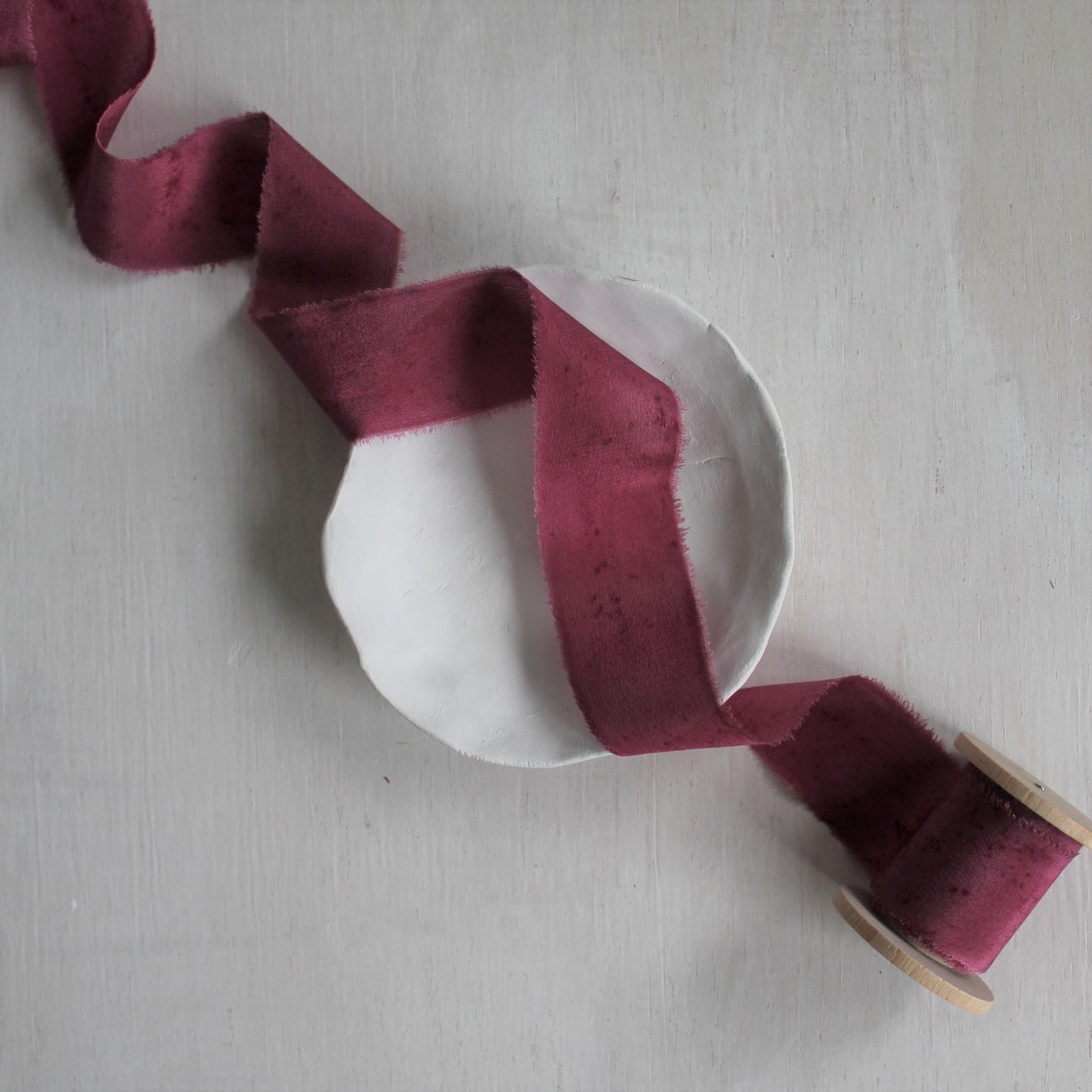 Naturally dyed hand-torn silk ribbon in berry color, 3 yards long, for wedding decor.