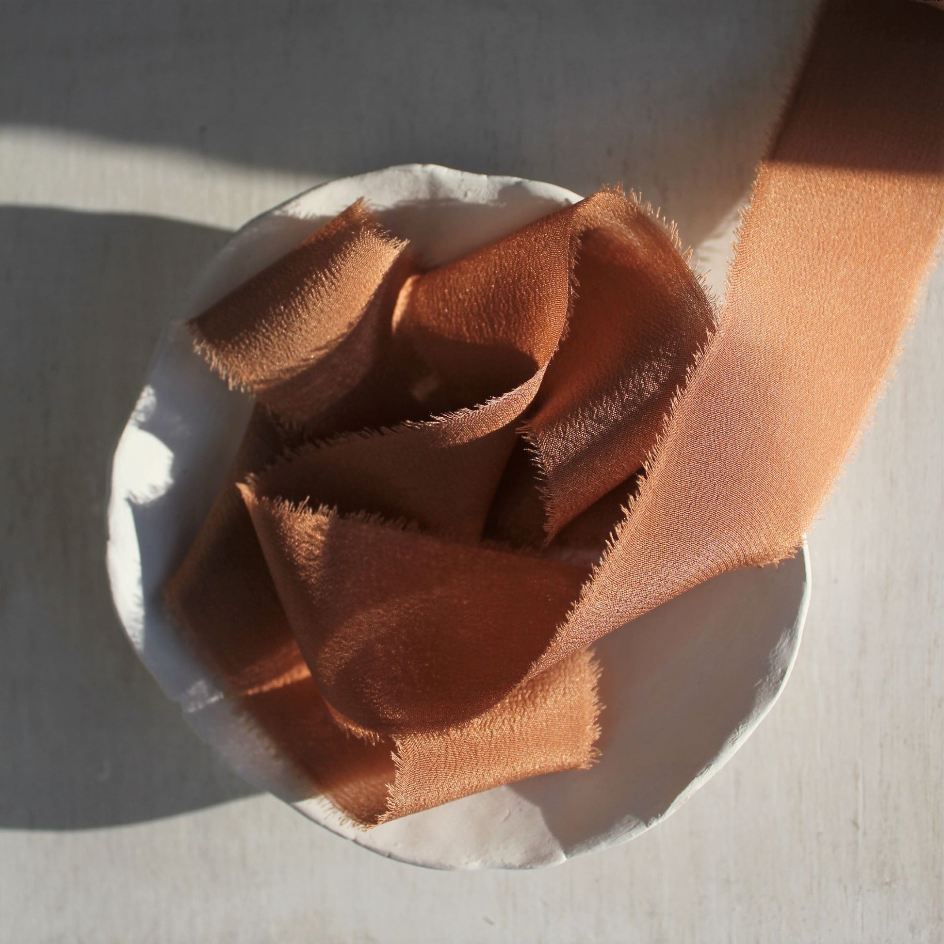 Canadian-dyed silk ribbon for luxury paper goods
