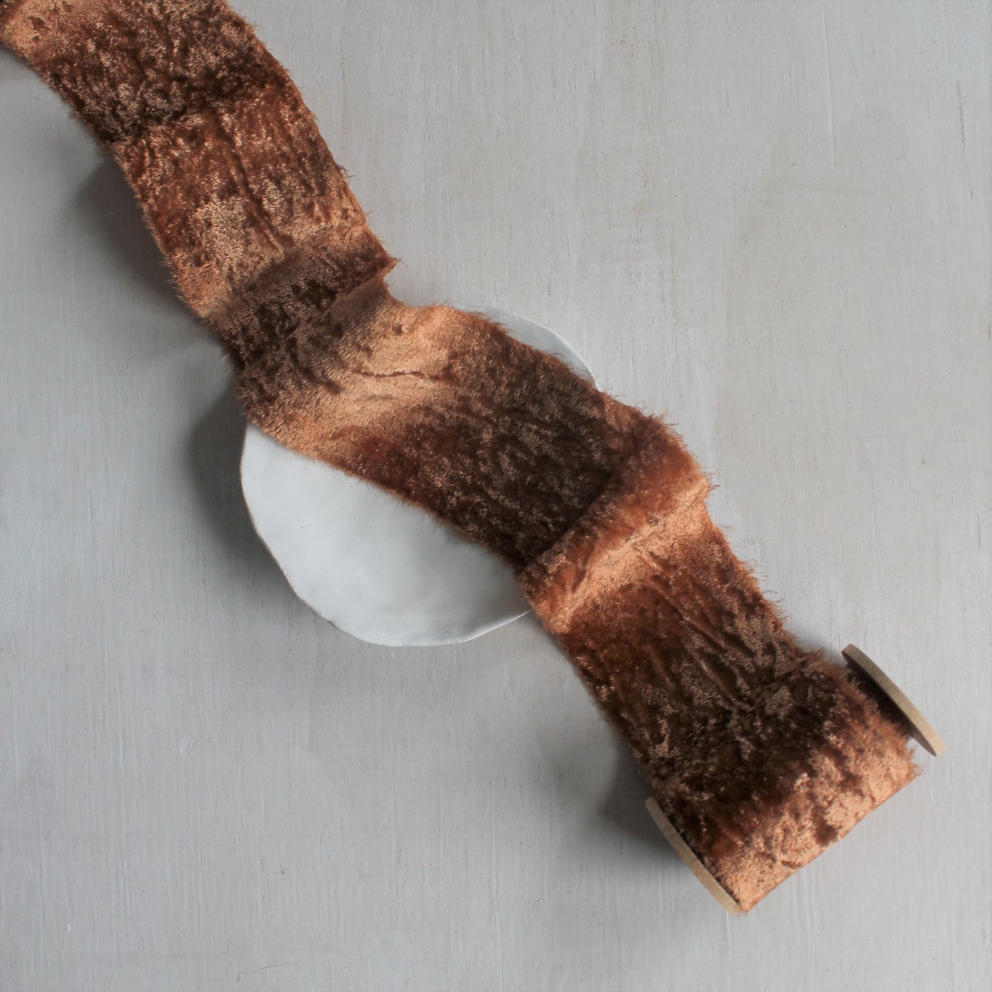 Terra cotta velvet silk ribbon rolled